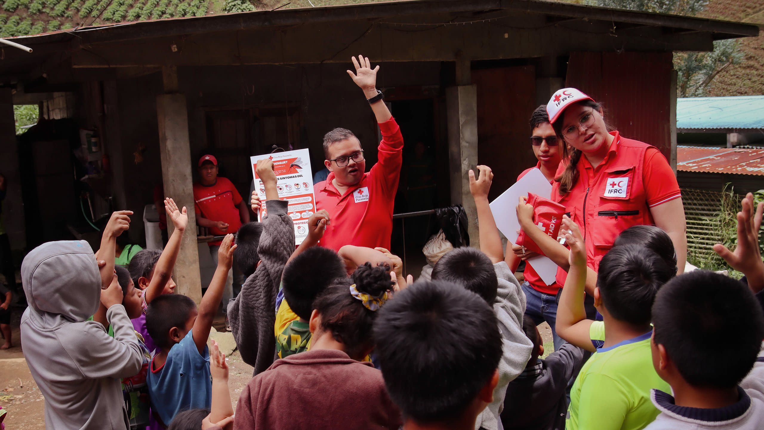The Panama Red Cross shares key messages with children on dengue fever after the health ministry asked the National Society to help with its response; the Climate Centre jointly authored a working paper in 2024 to guide National Societies planning to engage in early action for disease outbreaks. (Panama Red Cross)