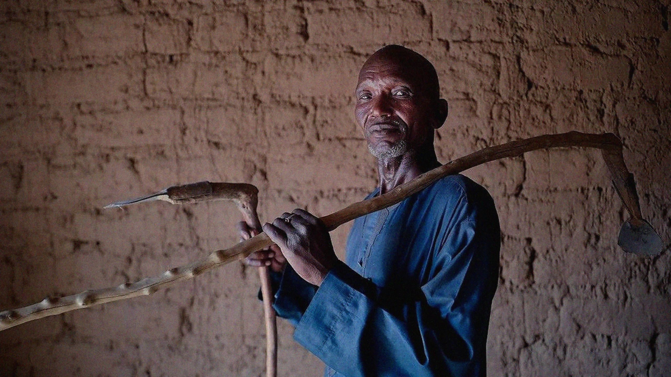 Farmers like Amadou Keydou (pictured) were assisted by a US $9.5m CERF grant triggered by poor rainfall in Niger; his story appeared in a UNOCHA publication presented at the 12th Global Dialogue Platform on anticipatory action in Berlin. (UNOCHA)